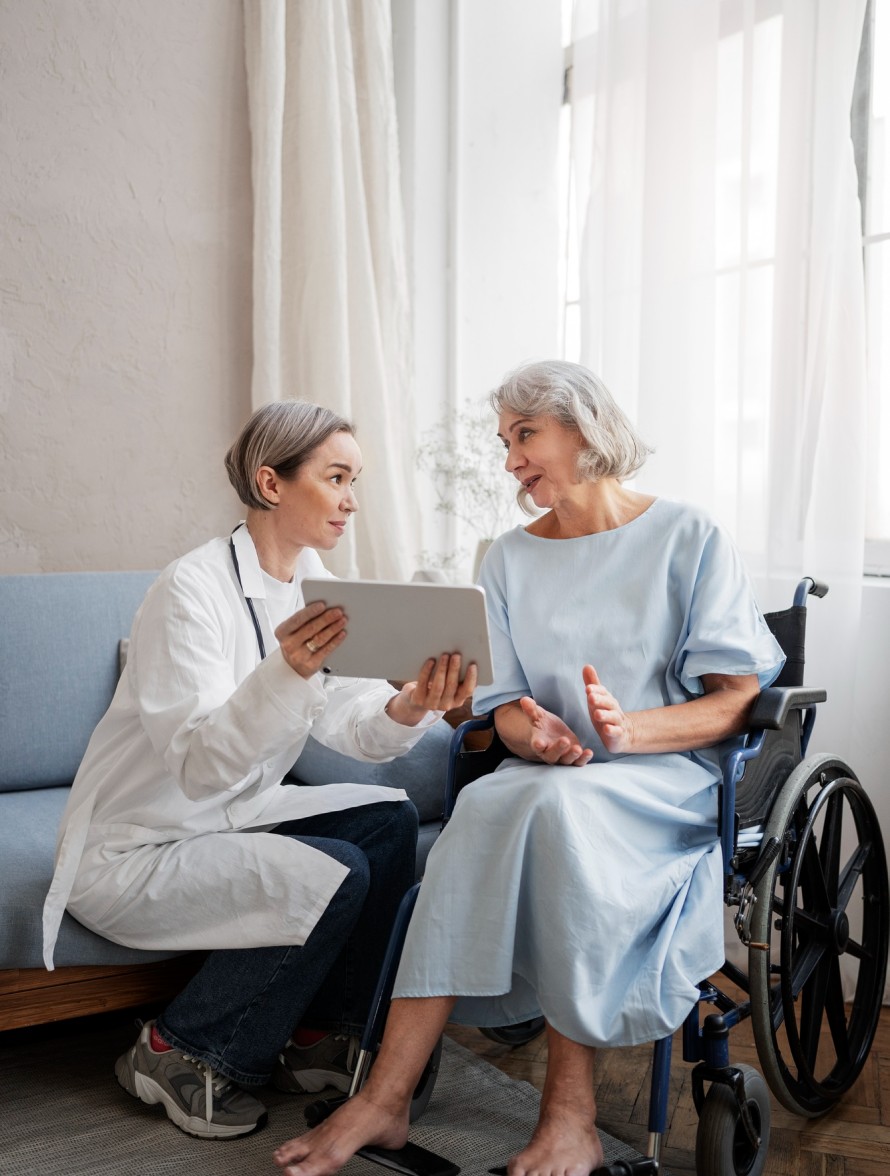 a nurse comforting an elderly woman