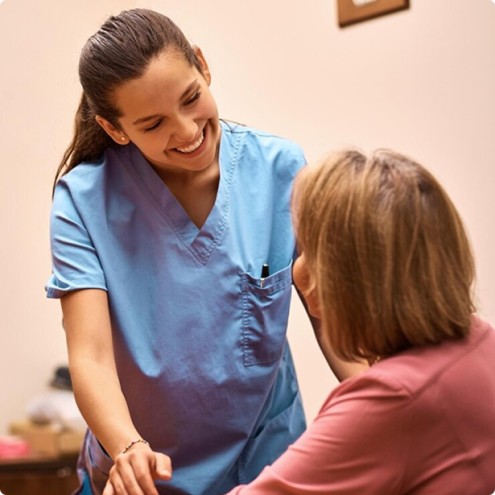UMS support worker assisting a client with developmental disability support